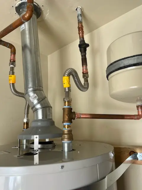 Water heater installation and plumbing repair in Colonial Manor